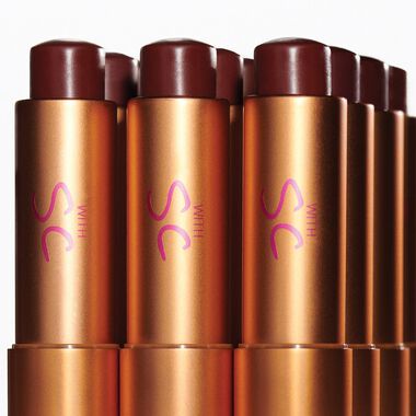faces the tinted lip balm