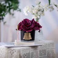 faces home diffuser five rose carmine red in black glass with gold badge