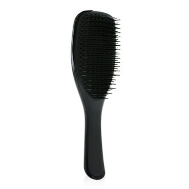 The Wet Detangling Hairbrush faces the wet detangling hairbrush