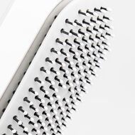 Self-Cleaning Hair Brush faces self cleaning hair brush