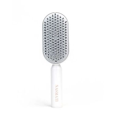 Self-Cleaning Hair Brush faces self cleaning hair brush